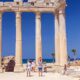 Tourists visit the Temples of Apollo and Athena in Side